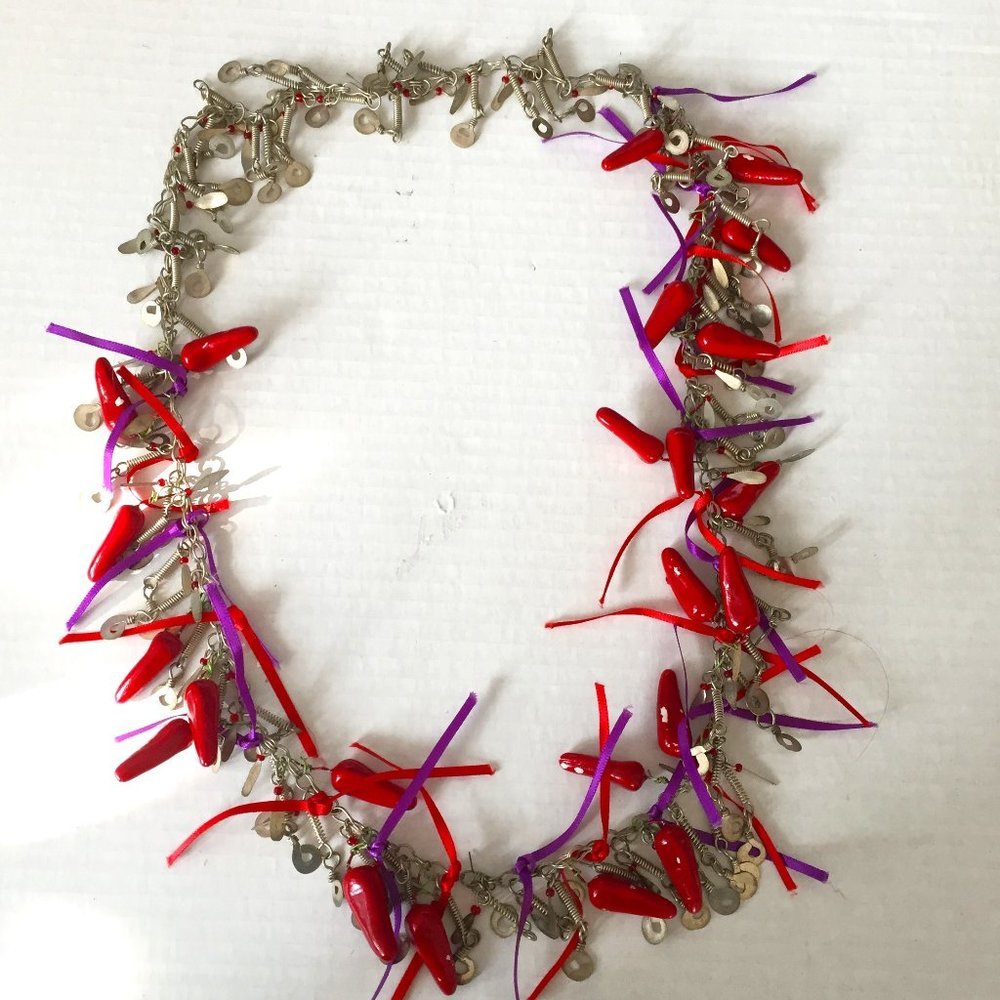Silver red chile and red/purple ribbon necklace.